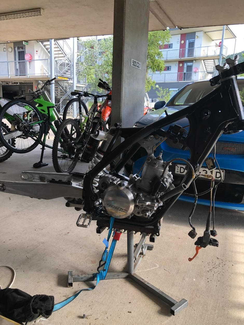 Motorcycle Frame With Engine Mounted on a Stand, Parked Outside — Bodes All Mechanical In Bombala, NSW