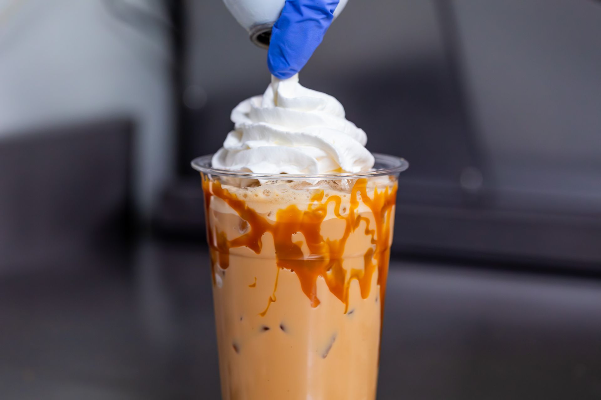 Breakfast plate with fried eggs, toast, sausage, and potatoes.