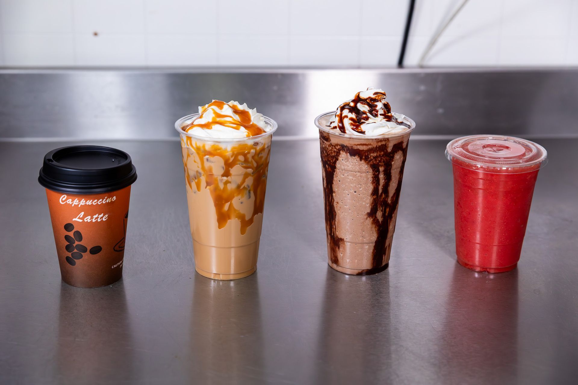 Avocado toast topped with egg, cucumber, tomatoes, and feta, being drizzled with balsamic vinaigrette.