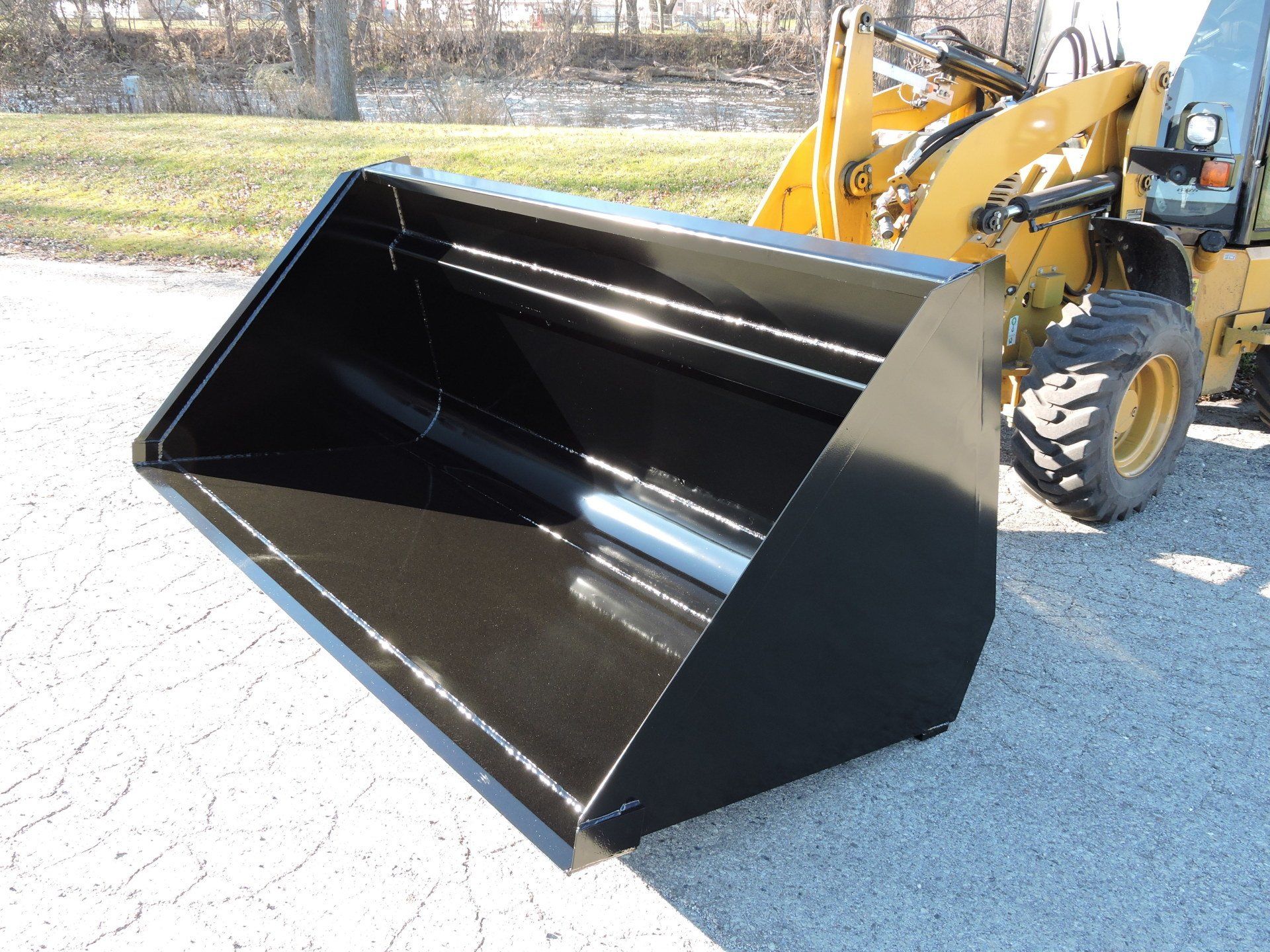 Custom Buckets for Skid Steers, Compact Tractors, Loaders Berlon