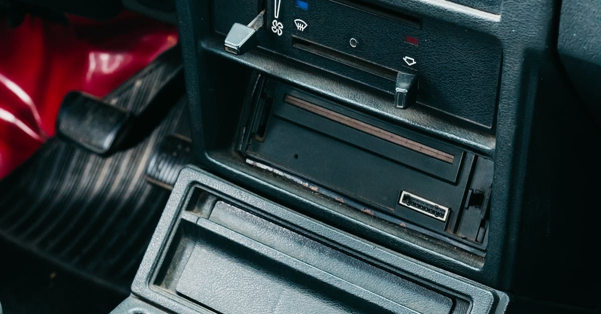 A close up of a car dashboard with a cd player in it | Pitts Automotive, Inc