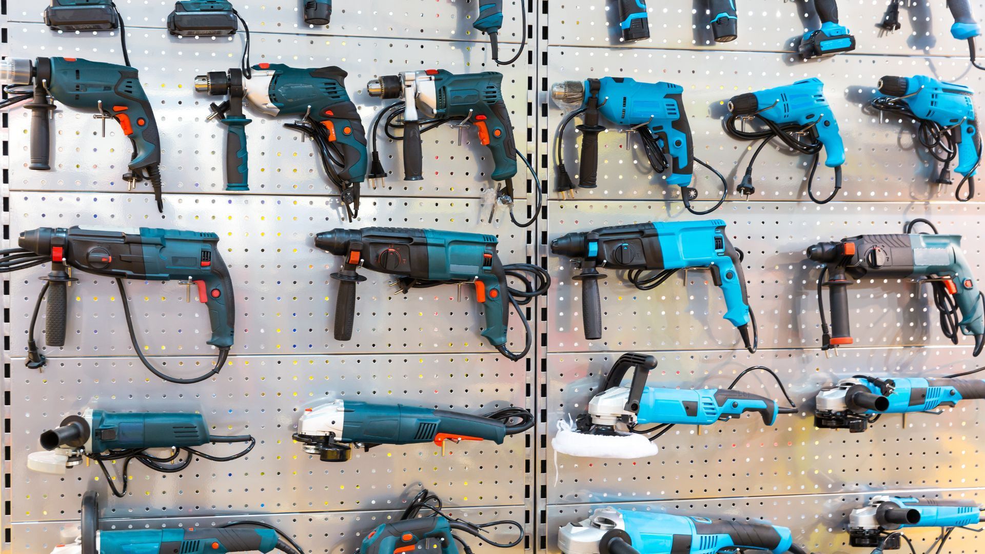 a wall filled with lots of different types of tools .