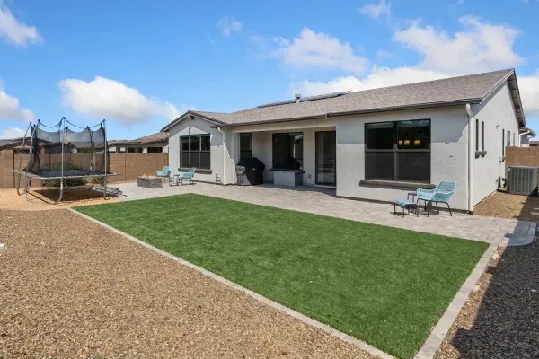 Backyard artificial lawn designed for year-round green