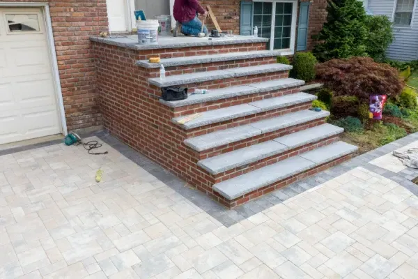 Brick and stone steps construction enhancing front entryways and outdoor spaces