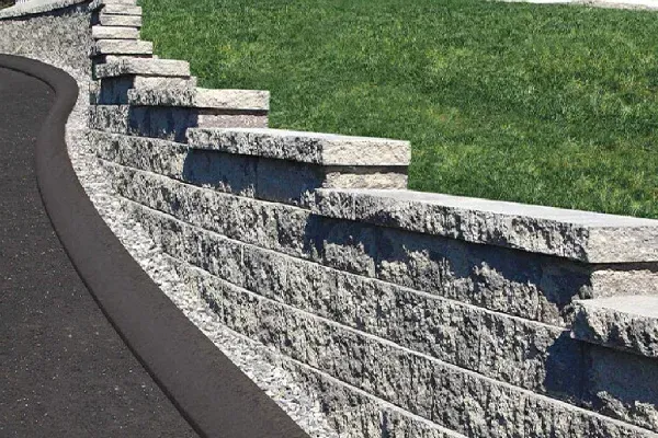 Professional retaining wall installation for landscaping and erosion control