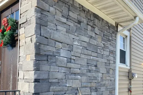 Custom masonry services including stone veneers, brickwork, and concrete block construction