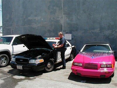 Transmission Organization — Police Car and a Pink Car  in Burlingame, CA