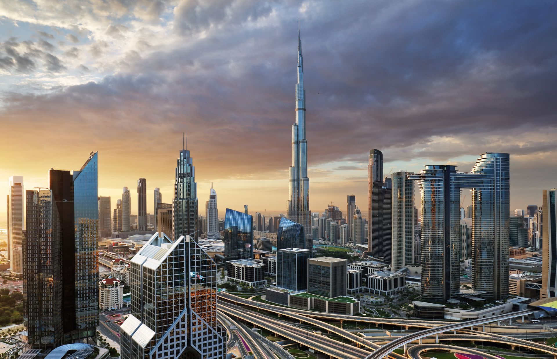 Dubai skyline with the Burj Khalifa at sunset.