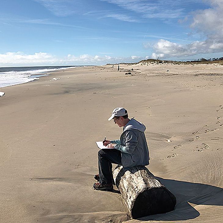 MaryBeth Hinrichs, sketching on the beach. © MaryBeth Hinrichs