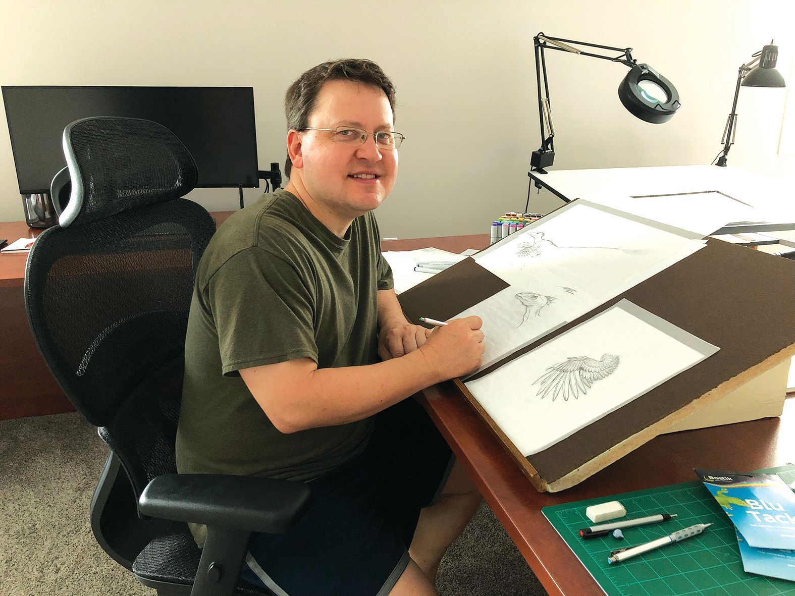 Figure 2: Rick Simonson in his studio
working on a new drawing.