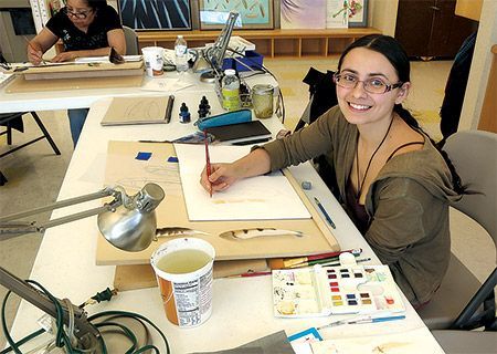 Students practice painting feathers. © 2024 Yale Peabody Museum Natural Science Program 