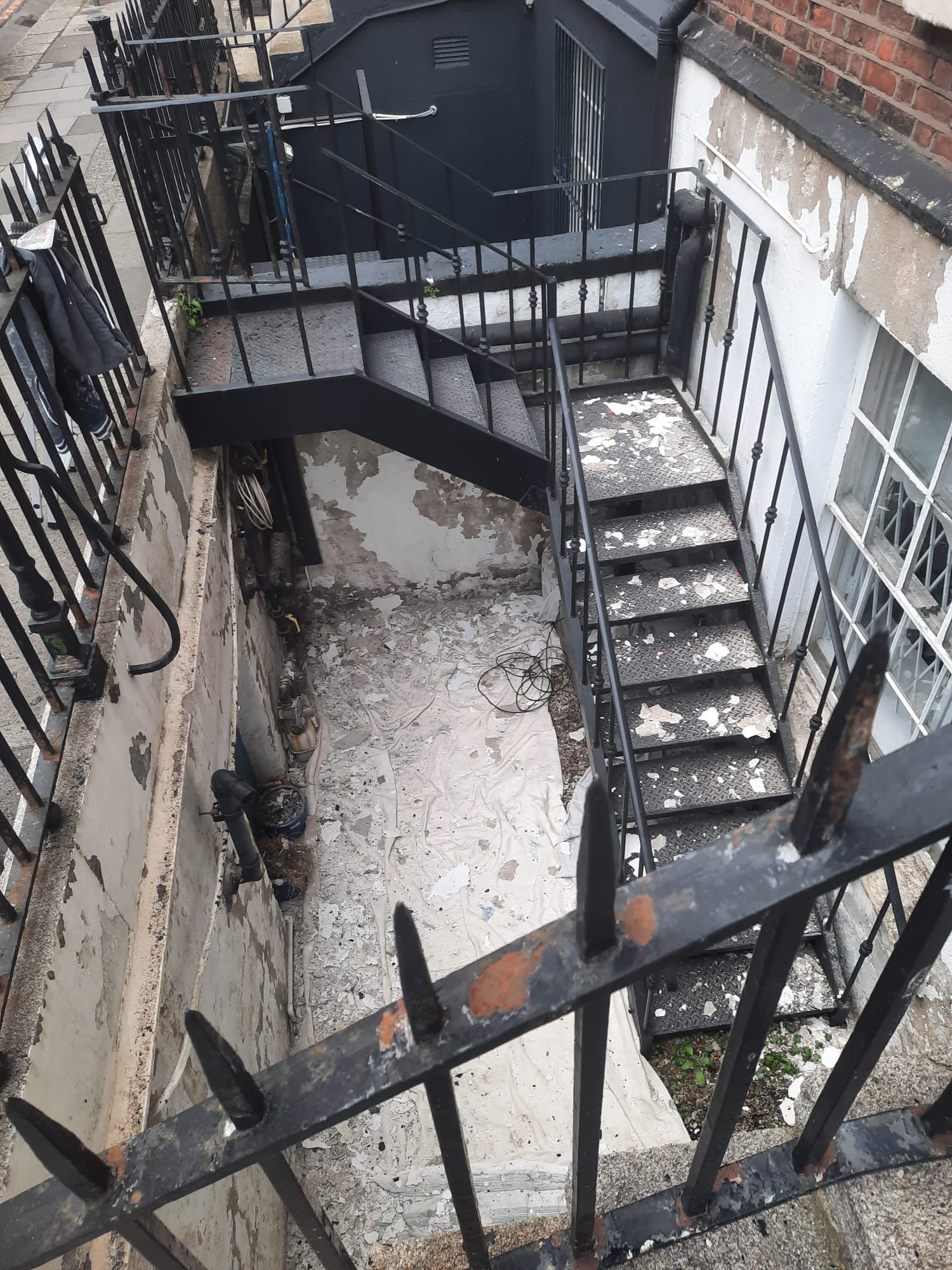 A set of stairs leading up to a building