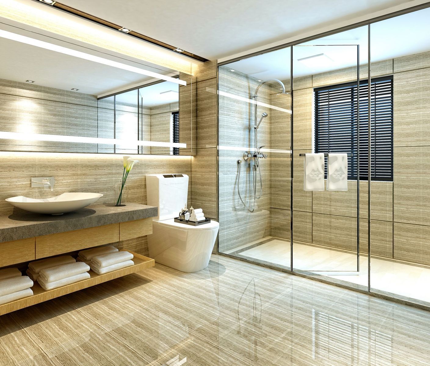 Bagno moderno con pareti e pavimento rivestiti in piastrelle beige, mobile lavabo in pietra, WC bianco e cabina doccia con box in vetro.