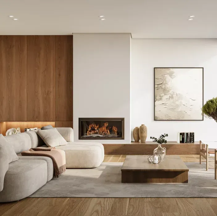 Soggiorno moderno con divano beige, parete con camino in legno, tavolino quadrato e opere d'arte astratte in uno spazio minimalista.