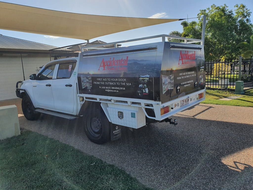 White Pick Up Truck Service Vehicle —  Accidental Health & Safety NQ & Mt Isa In Ayr, QLD