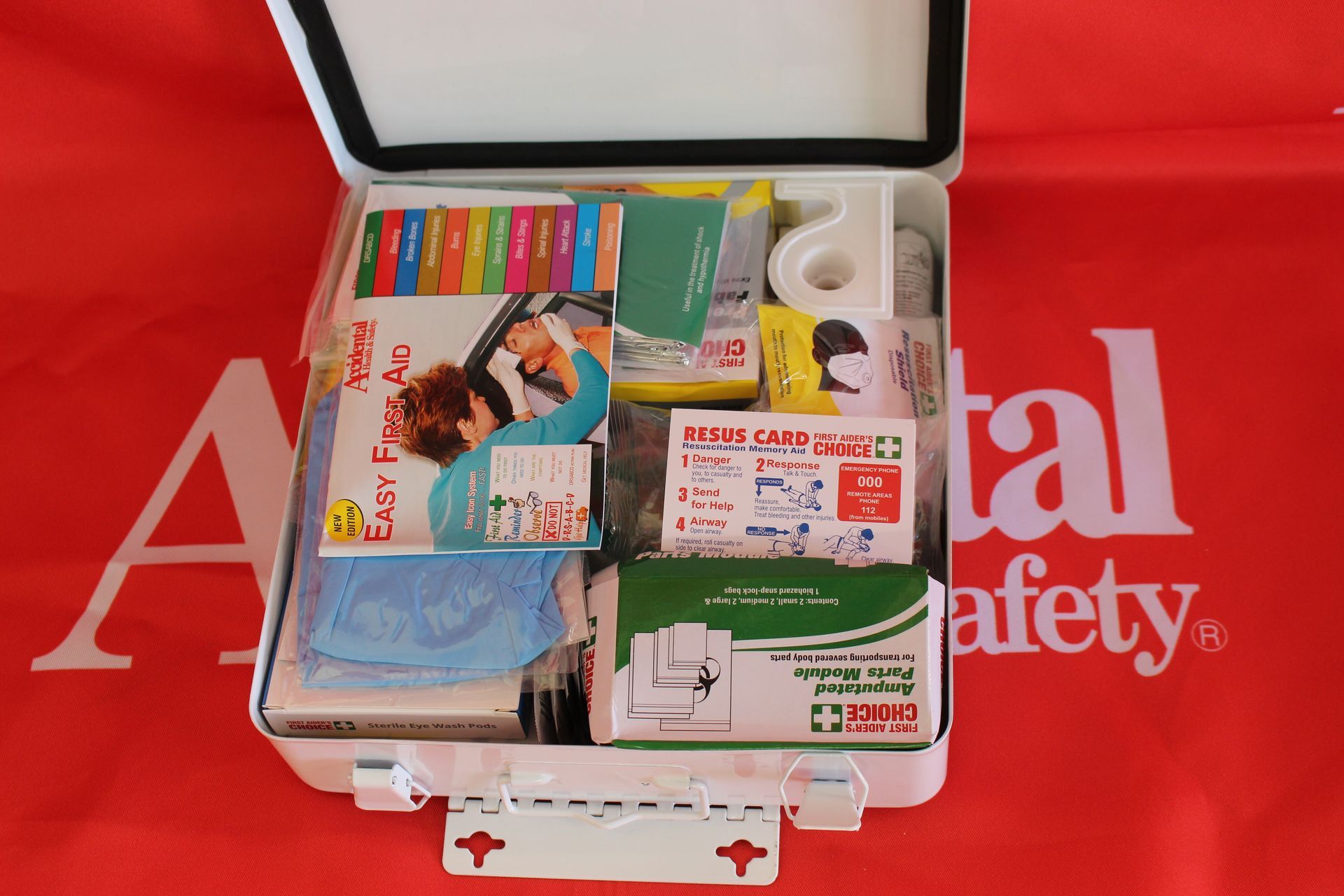 A First Aid Kit Is Sitting On A Table  —  Accidental Health & Safety NQ & Mt Isa In Ayr, QLD