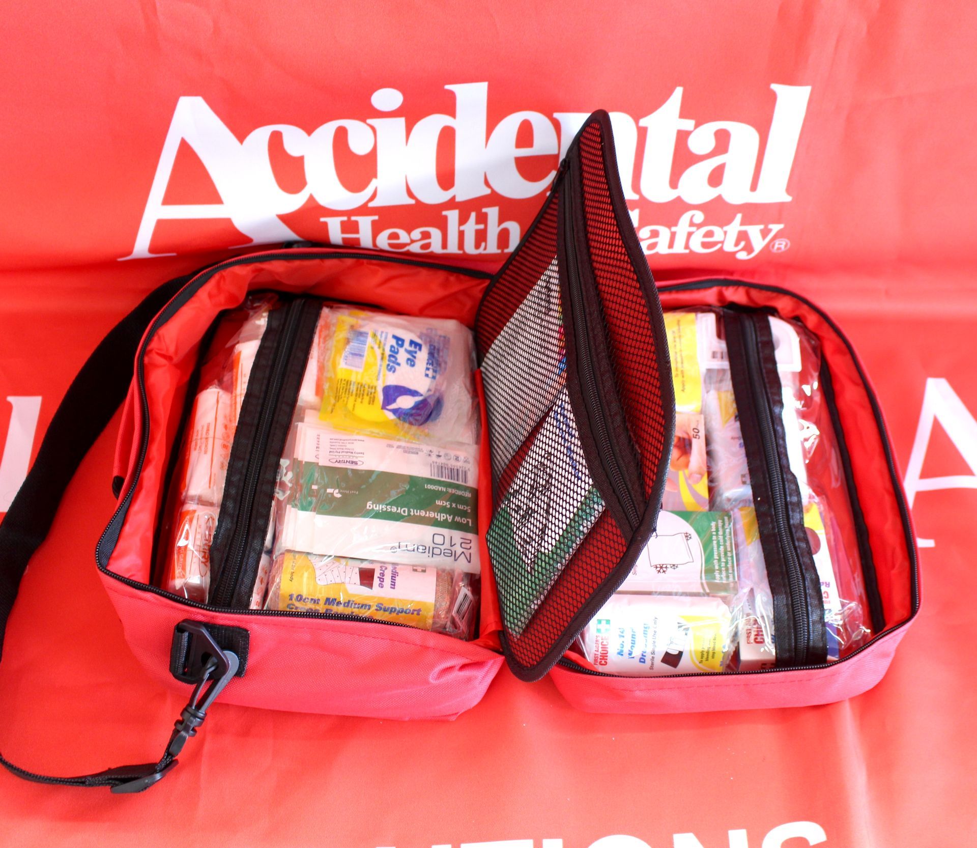 A Red Accidental Health Safety First Aid Kit  —  Accidental Health & Safety NQ & Mt Isa In Ayr, QLD