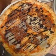 Pizza con prosciutto crudo, grana e aceto balsamico