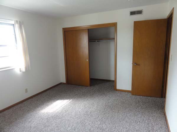 Wooden Door — Manhattan, KS — Plaza West Apartments