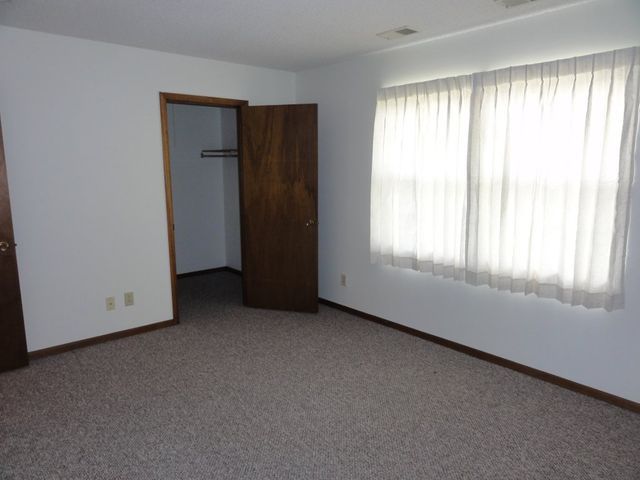 Simple Room — Manhattan, KS — Plaza West Apartments