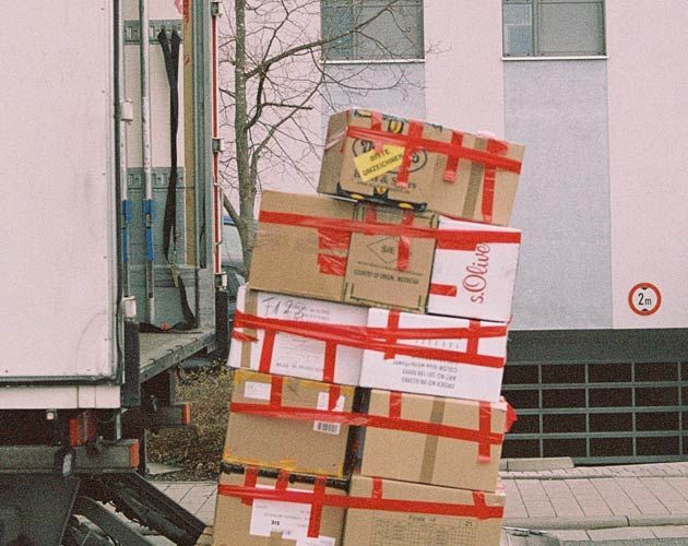 A stack of boxes with s.oliver written on them