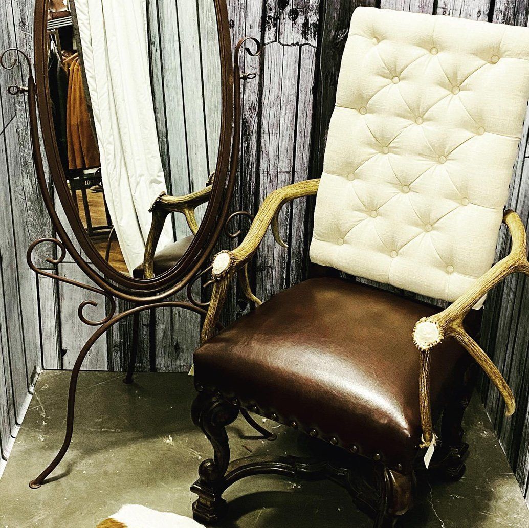 Rustic looking armchair made from deer antlers