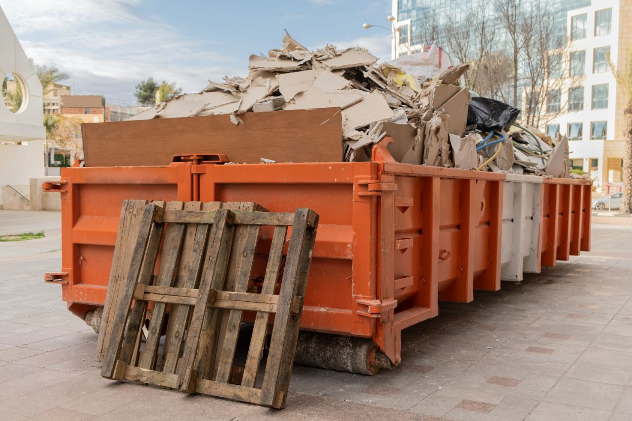 Overloaded Dumpster Waste Container — Demolition Contractors in Lismore, NSW
