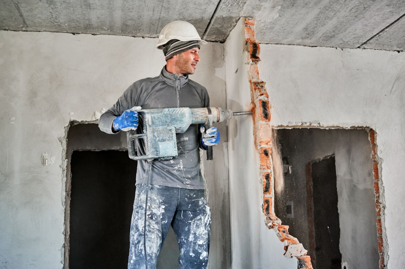 Worker with Drill Breaker — Demolition Contractors in Casino, NSW