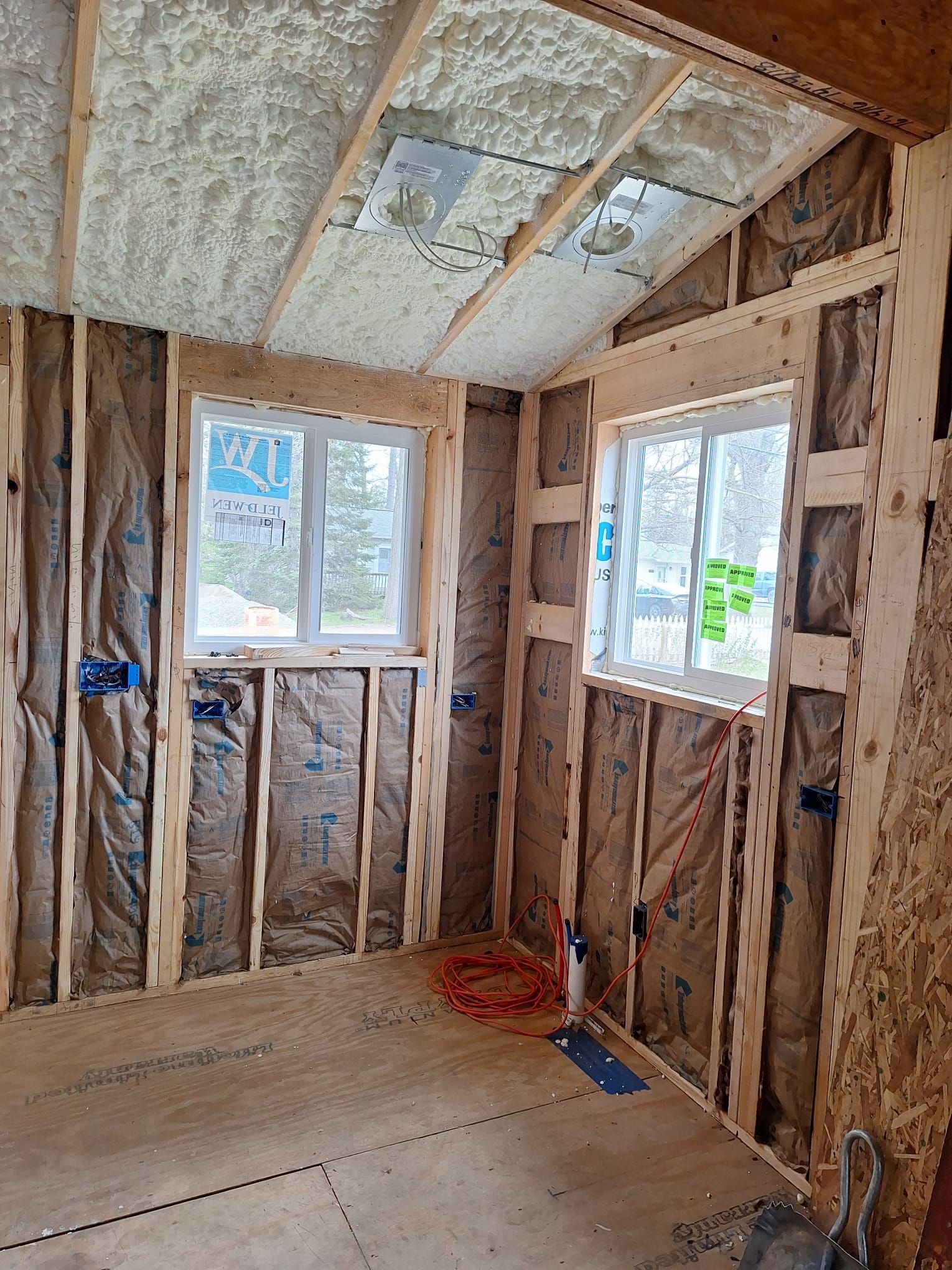 A room with a lot of insulation on the walls and ceiling.