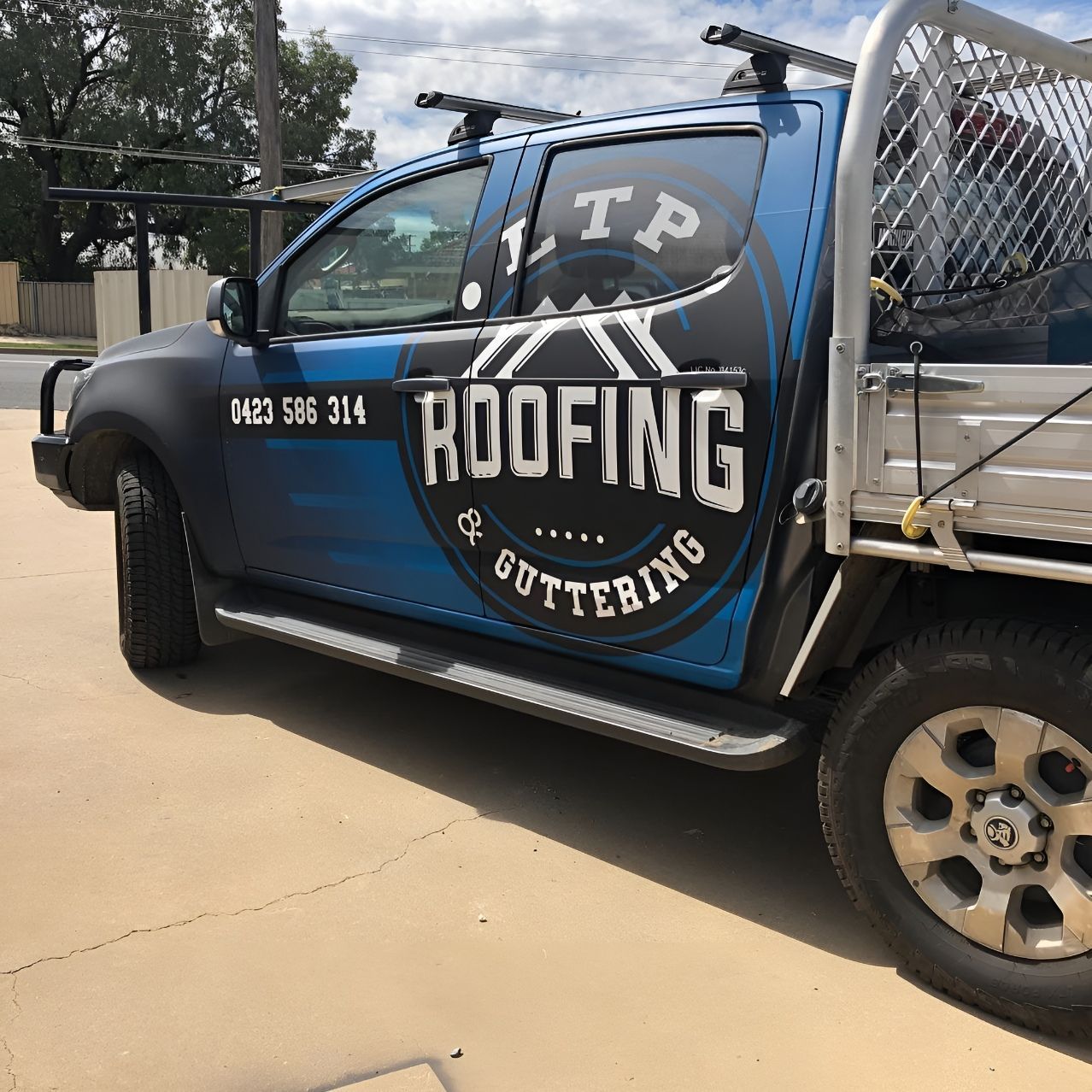 A Green And White Truck Is Parked In Front Of A Building — McKnight Signs In Hillvue, NSW