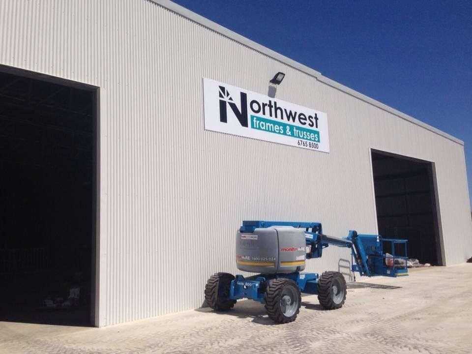 A Large White Building With A Sign That Says Northwest — McKnight Signs In Hillvue, NSW