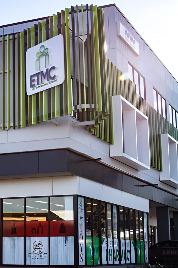 A Building With A Sign On It — McKnight Signs In Hillvue, NSW