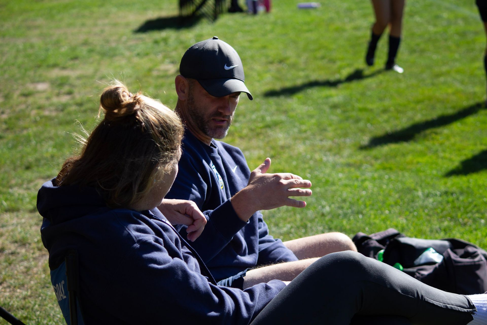 Founder Evan Botting with Girls Director Yvonna Press discussing strategy.