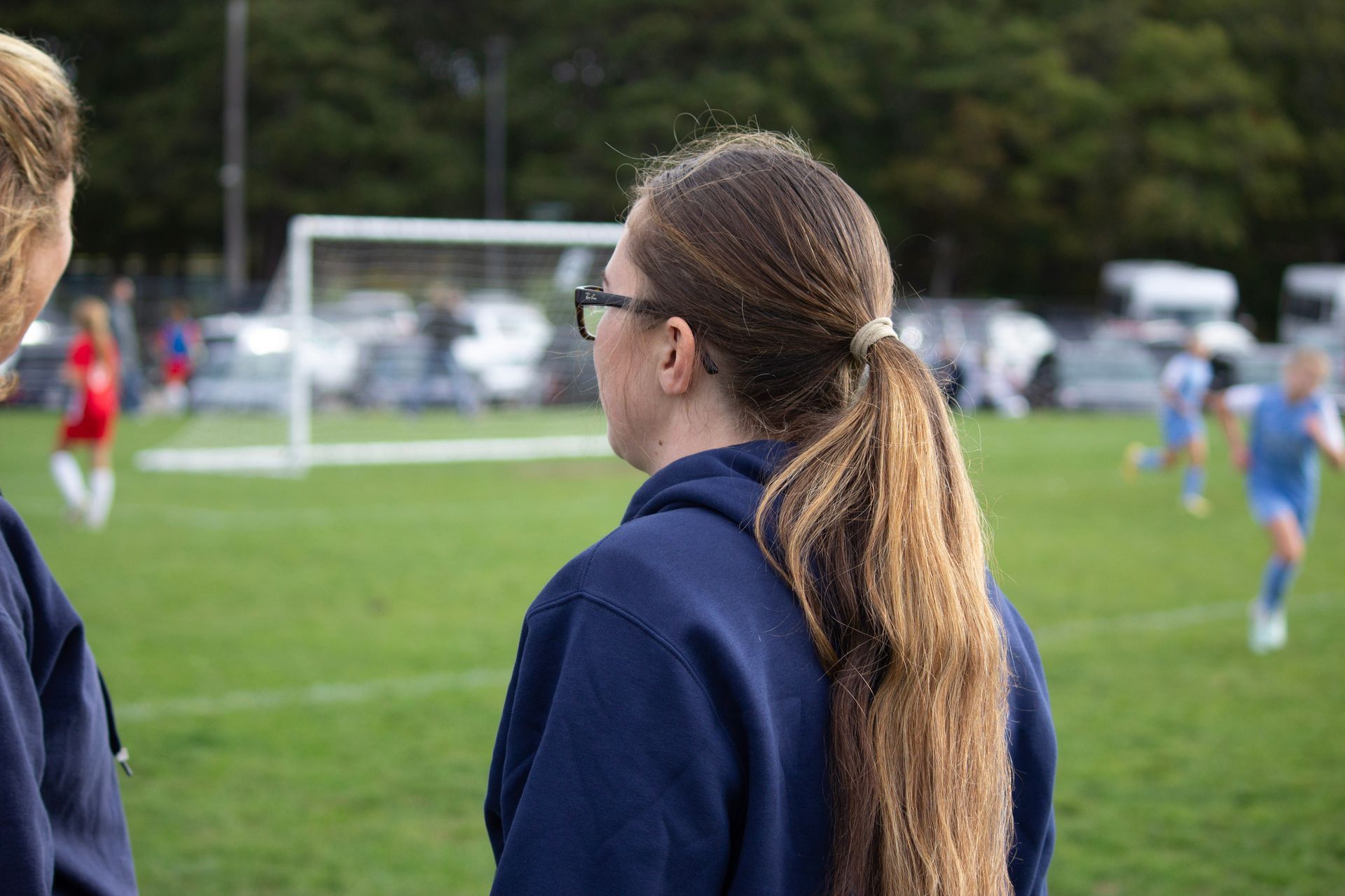 Summer Camps Director and Coach Sammi Botting, instructing during a game.