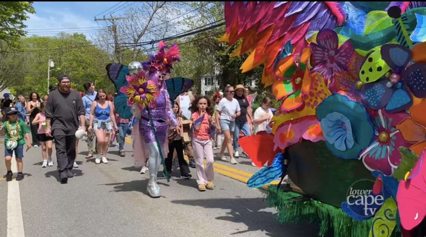 A colorful float at a town parade