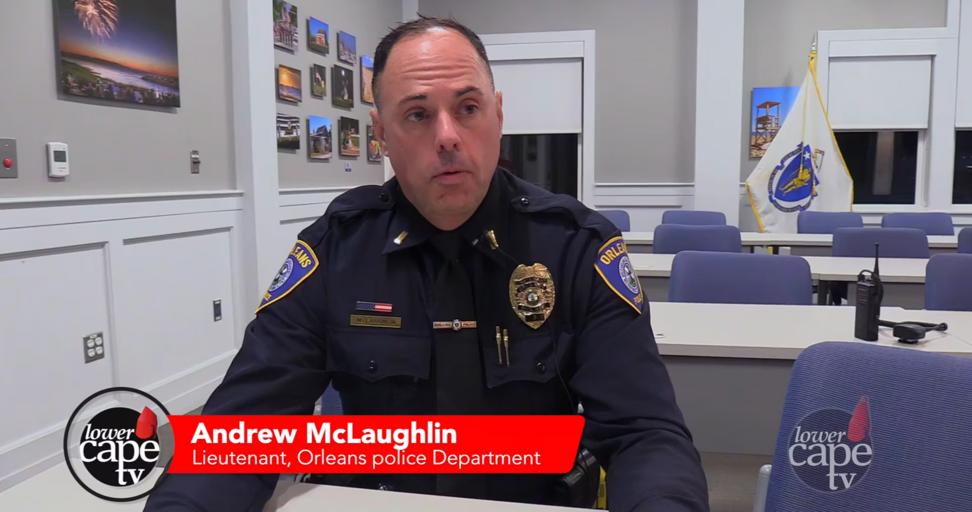 Police officer sitting at a table