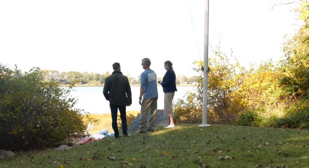 group standing at 72 Tonset parcel