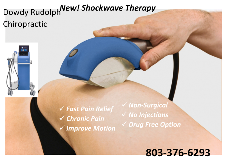 A person is getting shockwave therapy on their knee