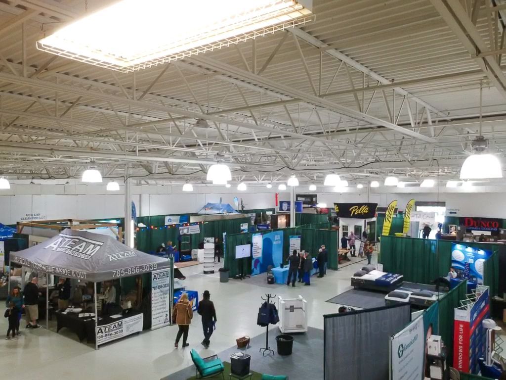 A large room with a lot of people in it