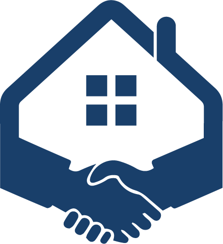 A couple of hands shaking in front of a house.