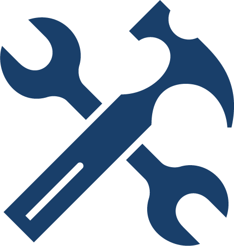 A wrench and hammer crossed over each other on a white background.