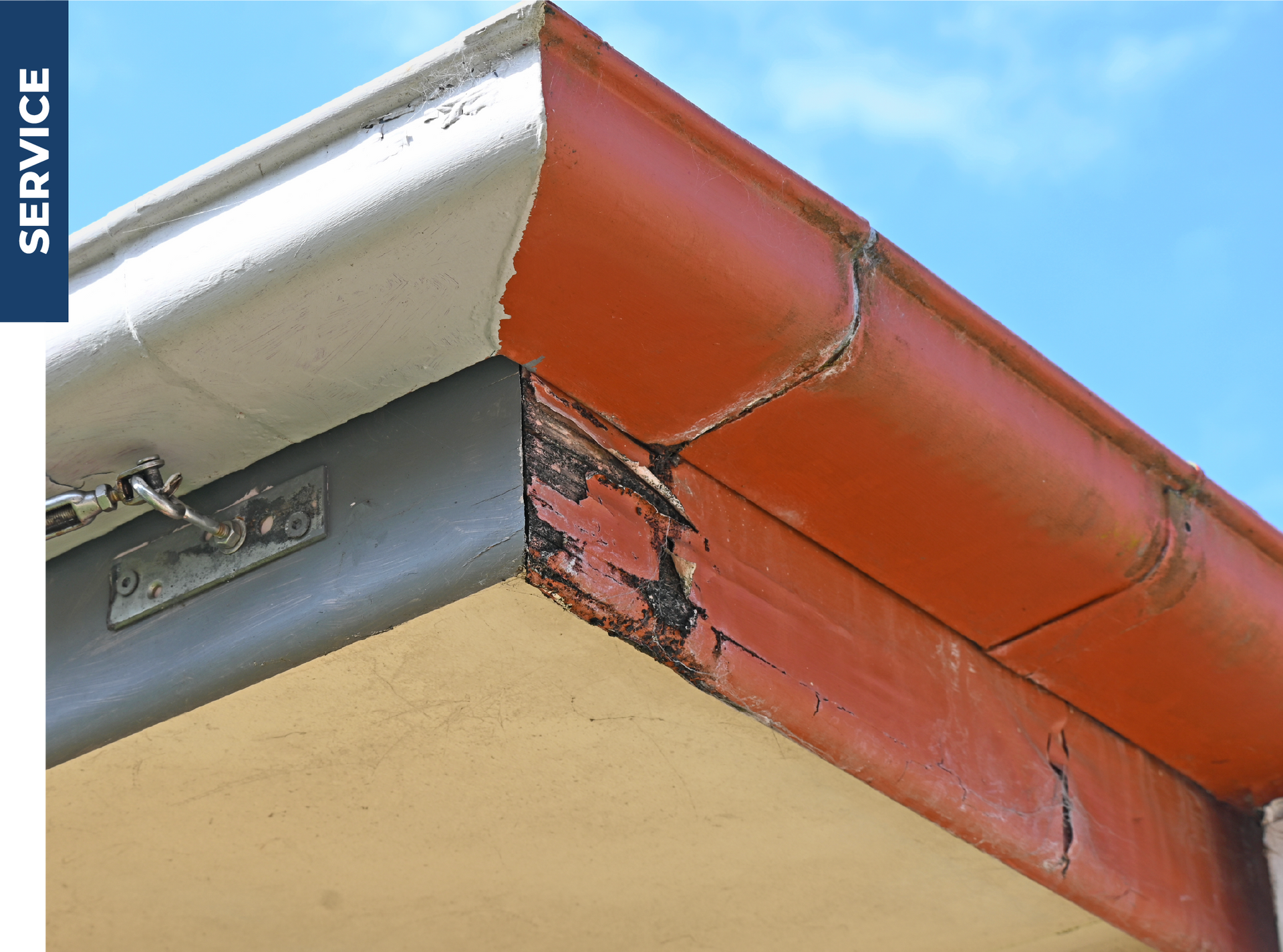 A picture of a gutter on a roof with the word service below it