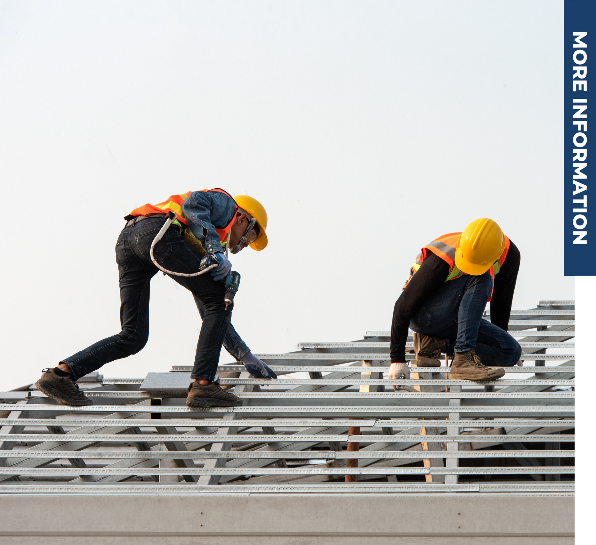 Two construction workers are working on the roof of a building.