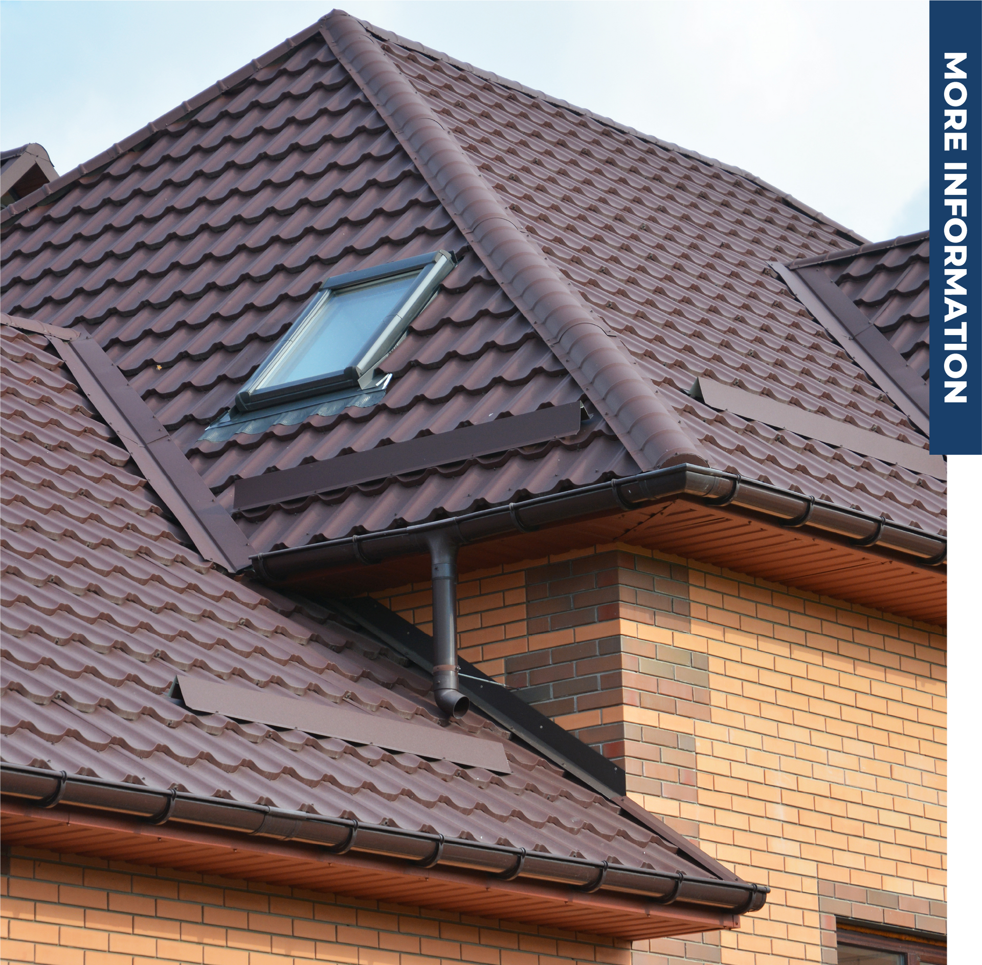 A brick house with a brown roof and a skylight