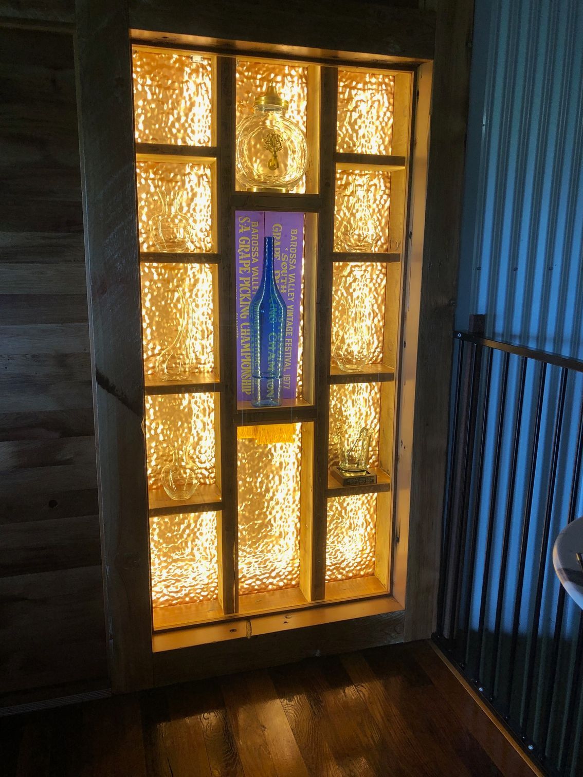 A Display Case with a Bottle on It — Nuriootpa, SA — Sparky's A Class Electrical