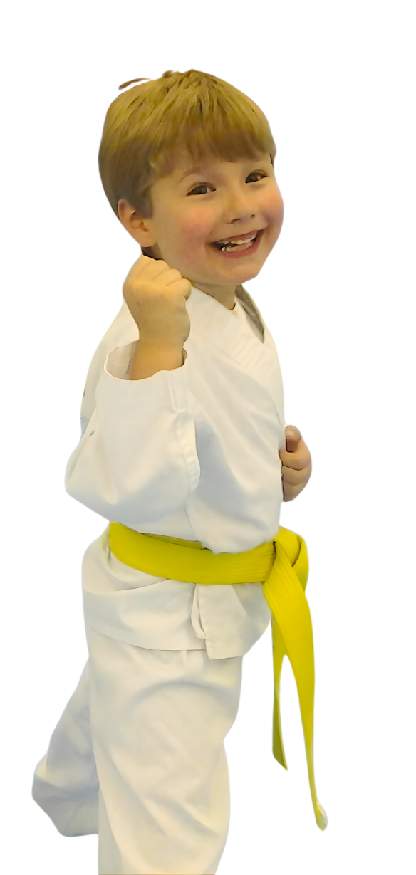 A boy and two girls are wearing karate uniforms and pointing at the camera