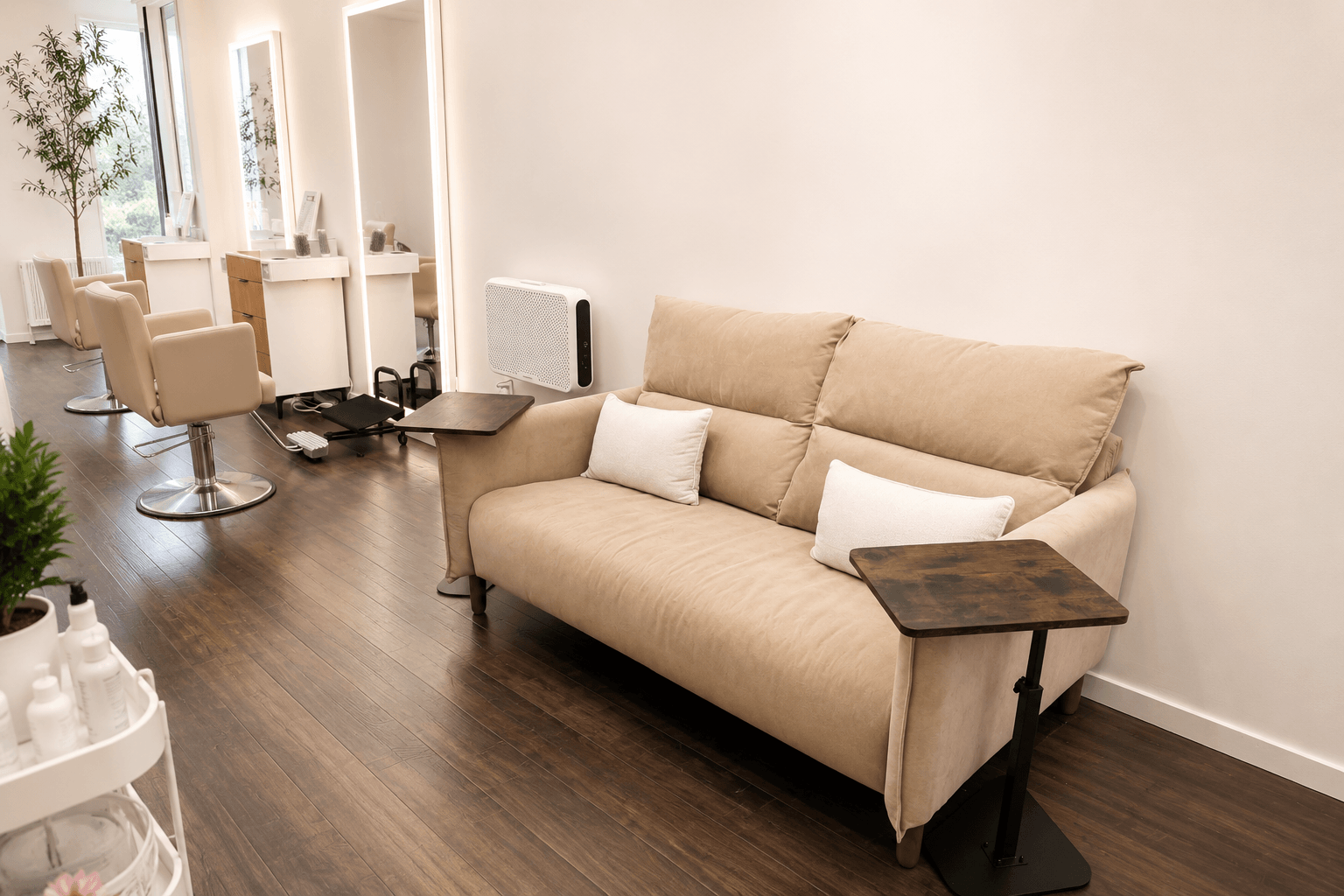 Salon interior &mdash; beige chair against white wall