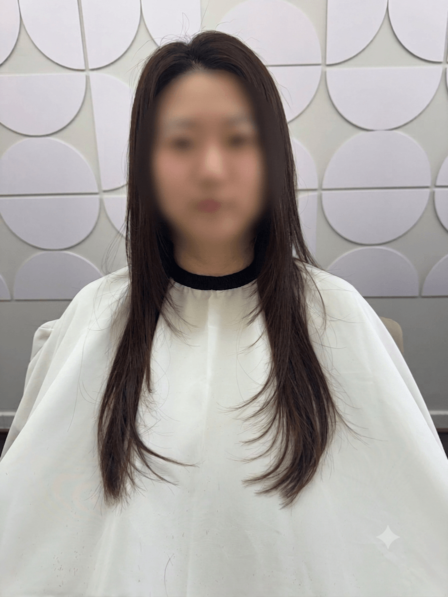 Freshly cut bob &mdash; clean ends, dark hair