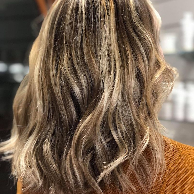 Woman With Wavy Blonde and Brown Highlighted Hair, Outdoors — Strut Hair & Beauty In Maroochydore, QLD