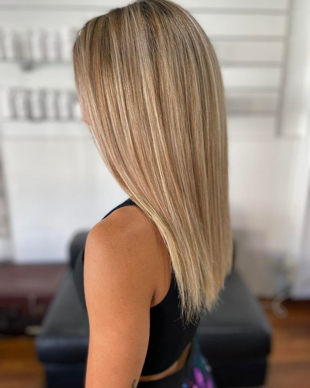 Woman With Long Blonde Hair, Styled Straight With Subtle Crimping — Strut Hair & Beauty In Maroochydore, QLD